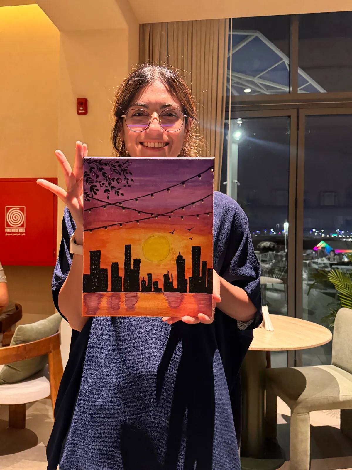 Guests painting at an Art & Pause workshop