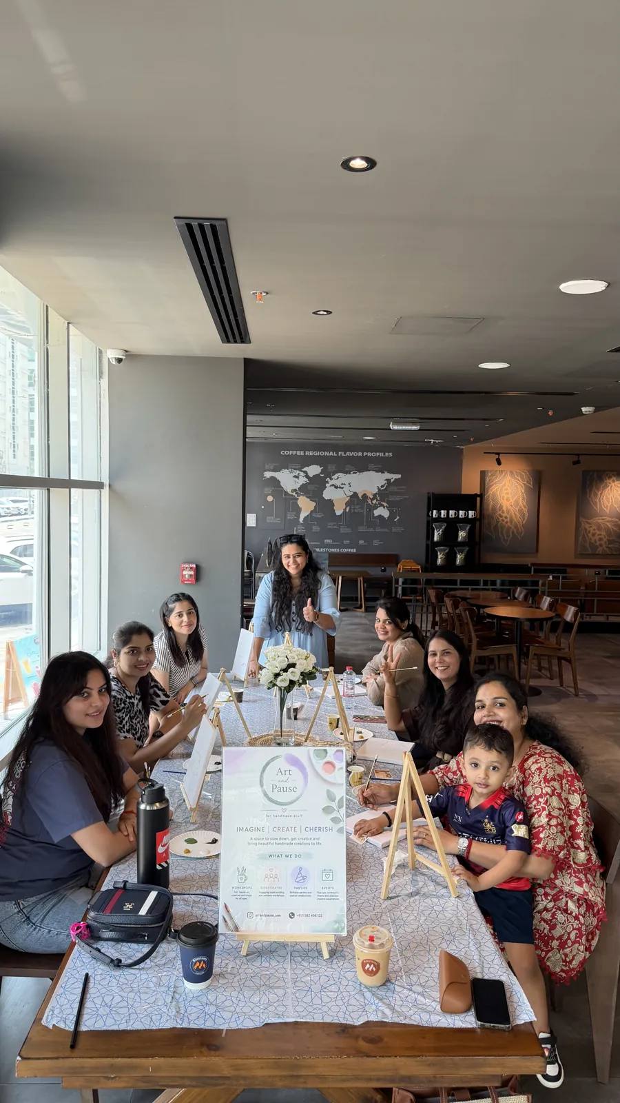 Guests painting at an Art & Pause workshop