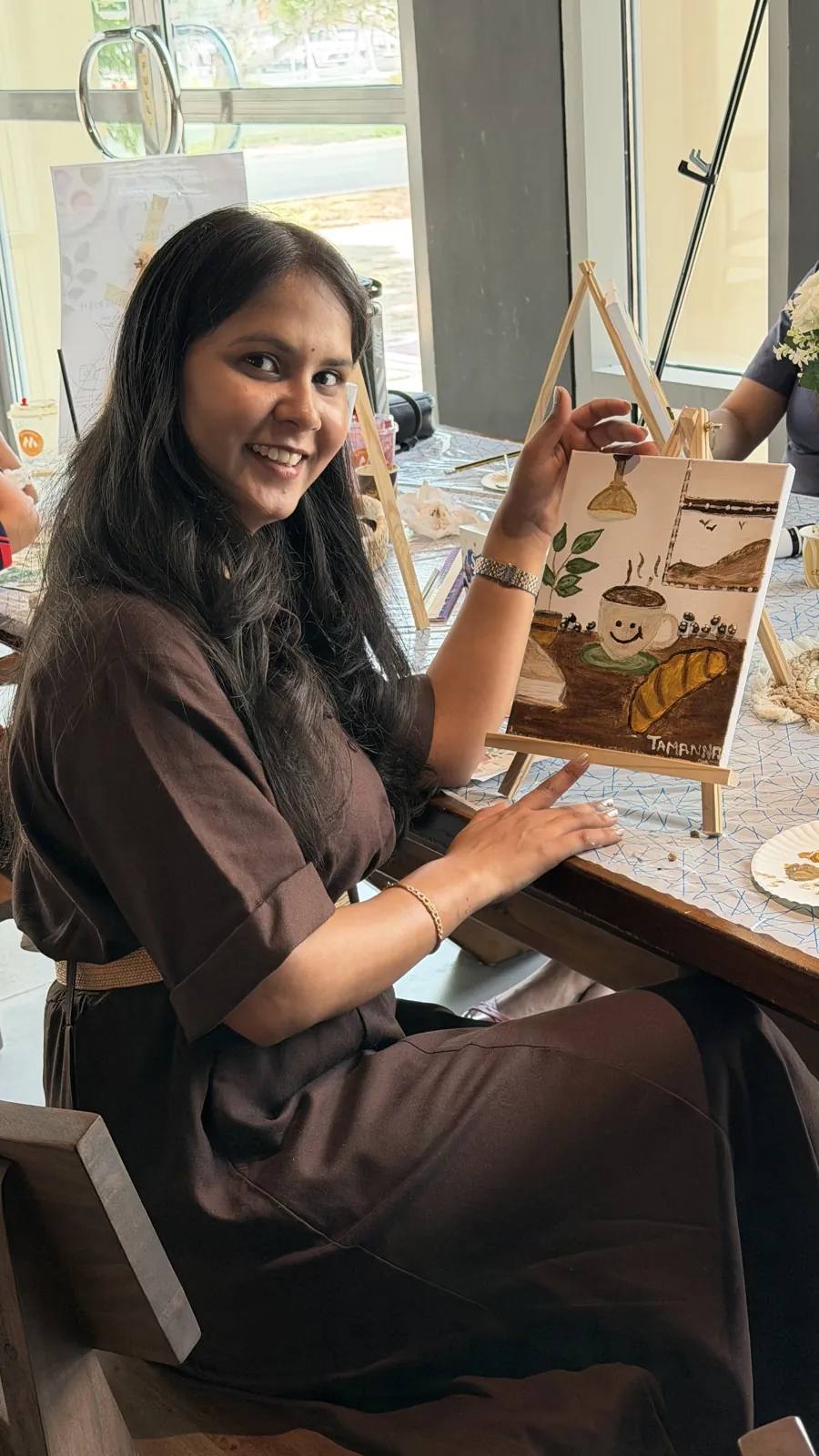Guests painting at an Art & Pause workshop