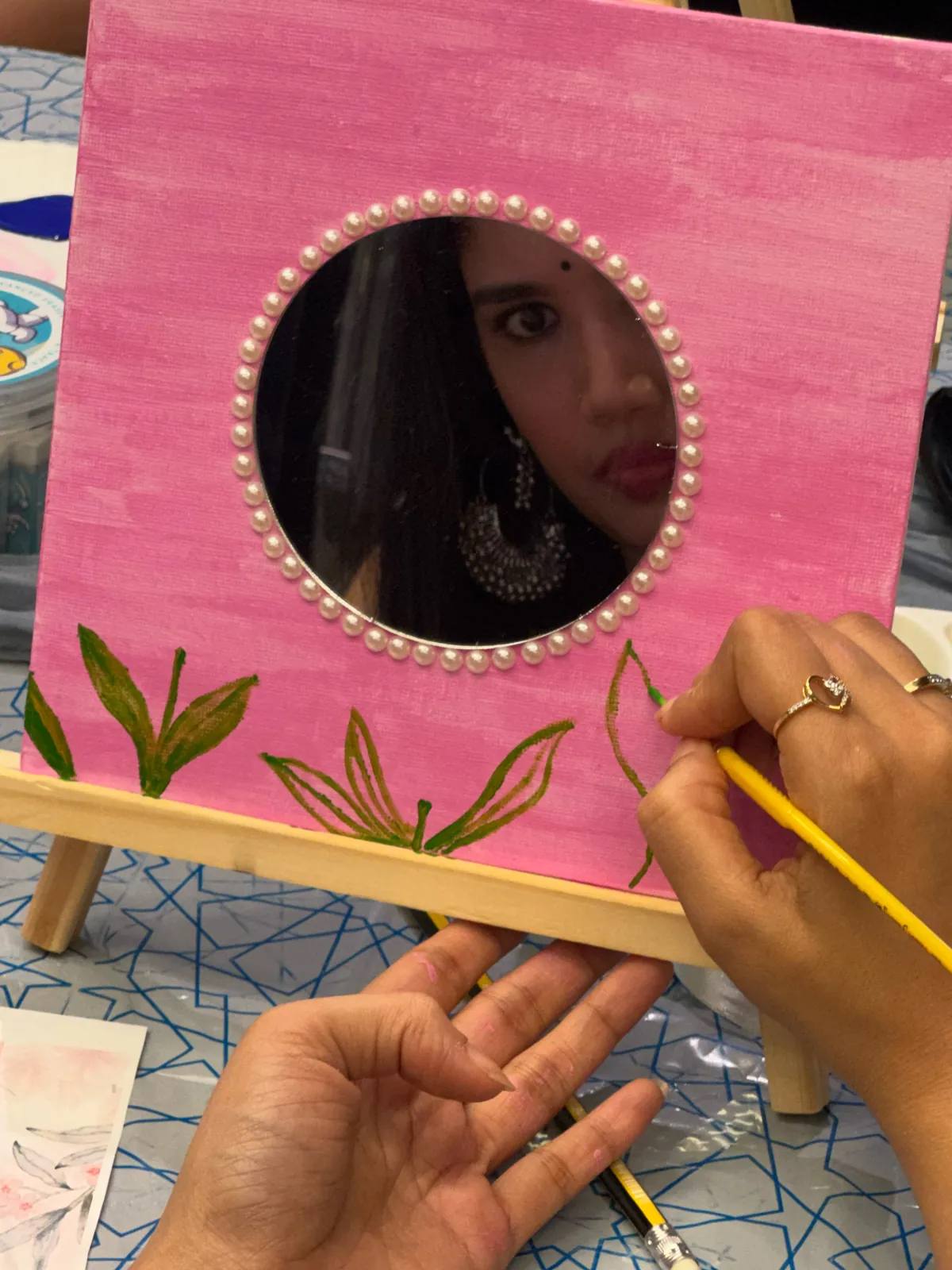 Guests painting at an Art & Pause workshop