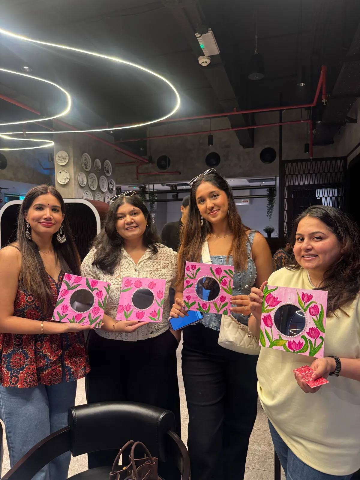 Guests painting at an Art & Pause workshop