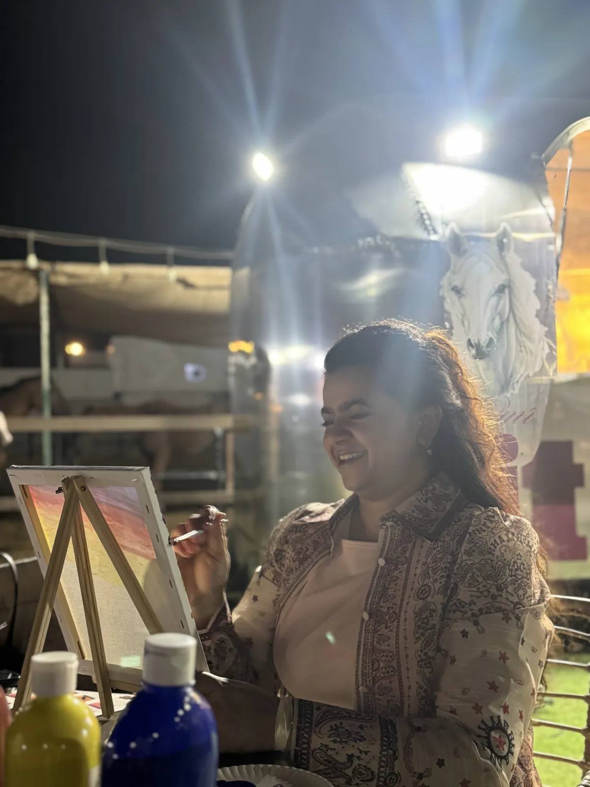 Guests painting at an Art & Pause workshop, at the horse stable, Al Shahama