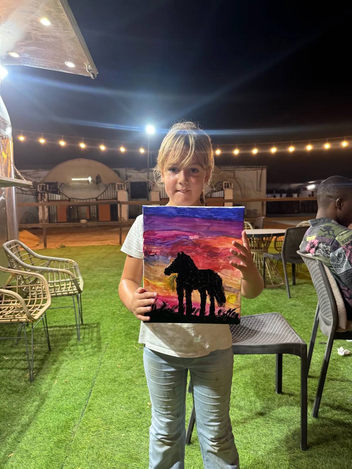 Guests painting at an Art & Pause workshop, at the horse stable, Al Shahama