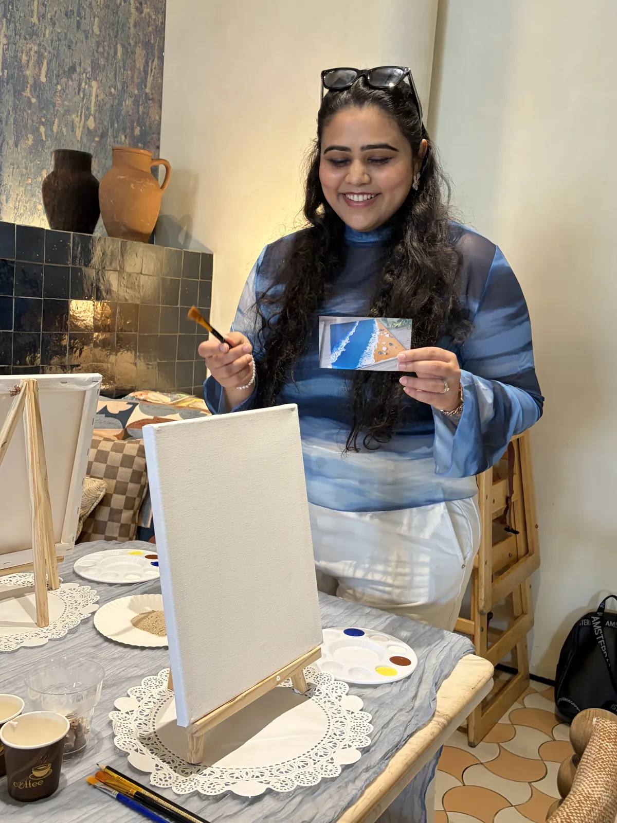 Guests painting at an Art & Pause workshop
